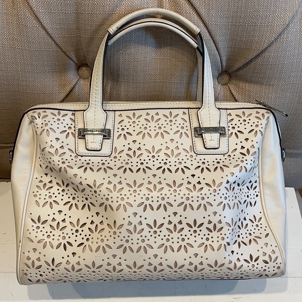 Coach Taylor Perforated Putty White Leather Satchel
12"L x 4.5"W x 8"H - Picture 2 of 11